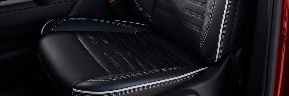 Close-up of the Interior Black Leather Seats in the Sierra HD AT4X AEV