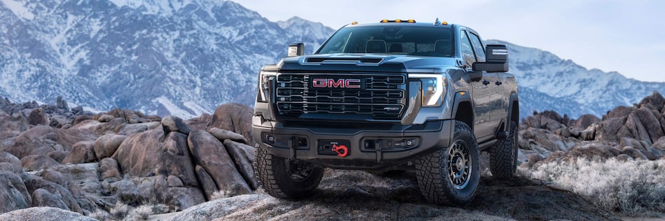 The GMC Sierra HD AT4X AEV Parked on a Rocky Mountain