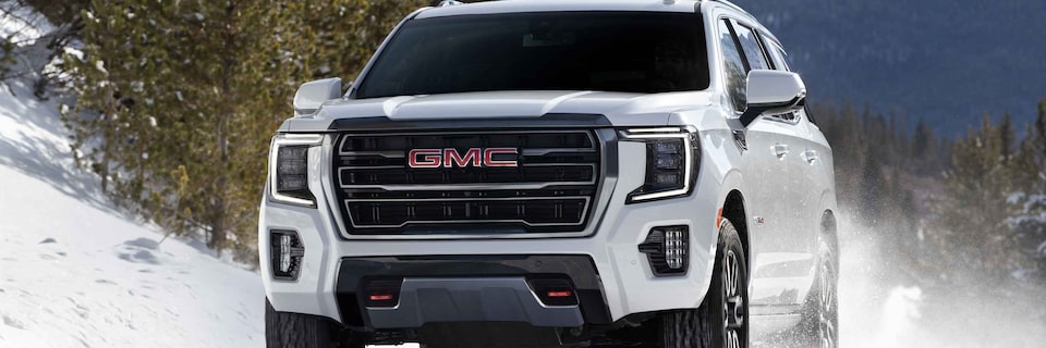 2022 GMC Yukon AT4 SUV Driving in Snow