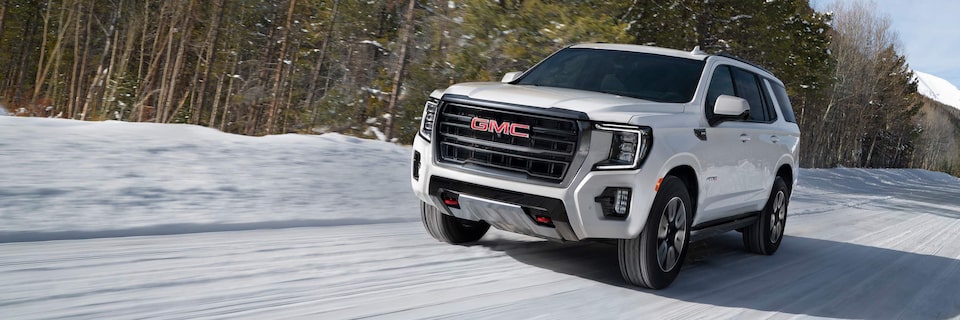 GMC AT4 Sport SUV Driving in Snow