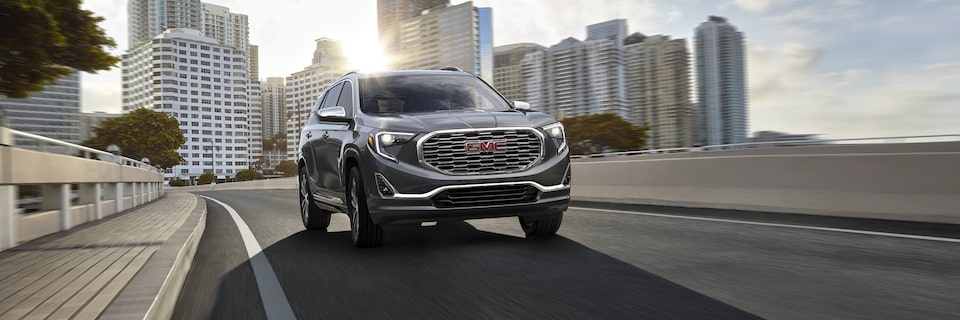 GMC Terrain Small SUV driving on road