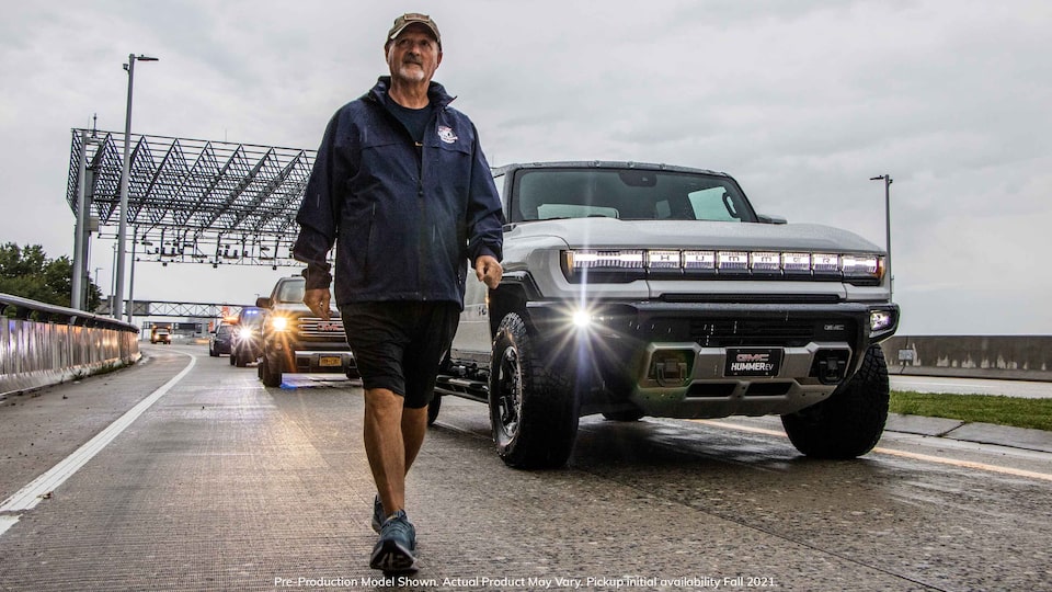 Tunnel to Towers Chairman and CEO Frank Siller walks alongside a convoy of GMC vehicles