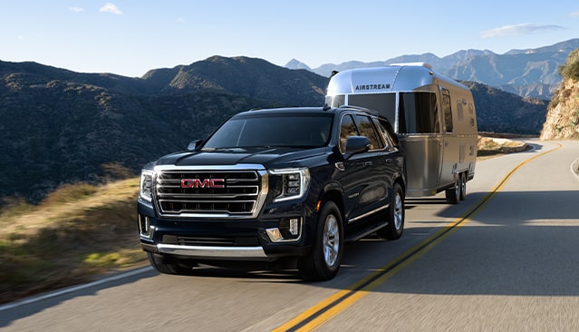 TOW WITH CONFIDENCE AND CONTROL WITH GMC YUKON’S TRAILERING TECHNOLOGIES