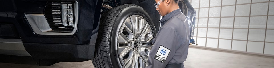 GM Certified Master Technician Installing a Wheel on a Vehicle