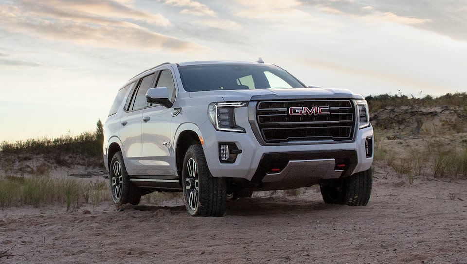 GMC Sierra Truck Parked in Mountain Scenery