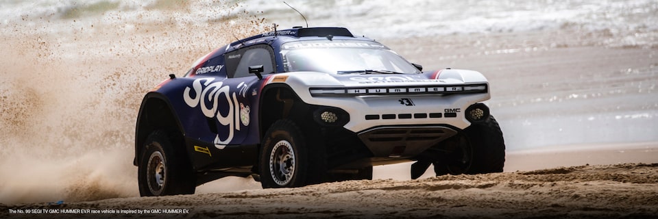 SEGI TV GMC HUMMER EV.R driving through desert