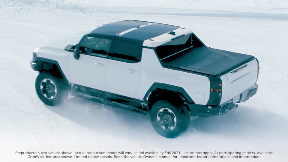 GMC HUMMER EV Supertruck Driving in Snow