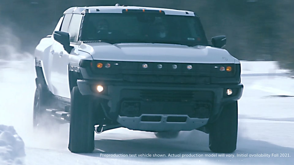 GMC HUMMER EV electric truck test drive on snow in Northern Michigan front view