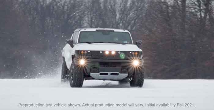 2021 GMC HUMMER EV test driving in the snow