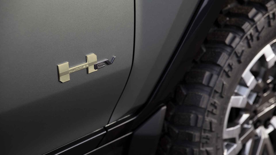 2023 GMC HUMMER EV electric SUV with Bronze HEV emblem