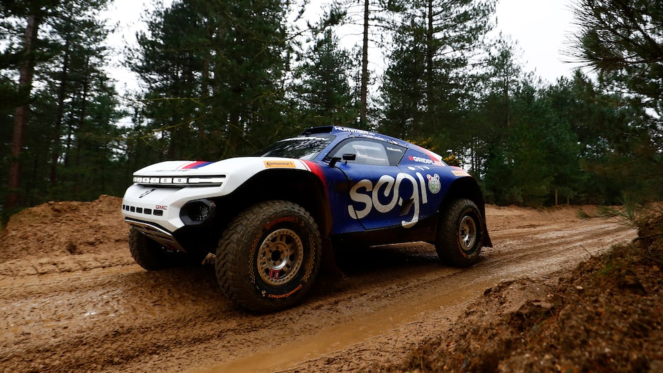 No.99 SEGI TV GMC HUMMER EV.R Driving on Dirt Road