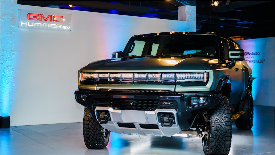 A Parked GMC HUMMER EV inside a Showroom