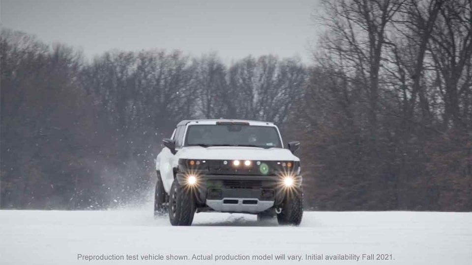 2021 GMC HUMMER EV test driving in the snow