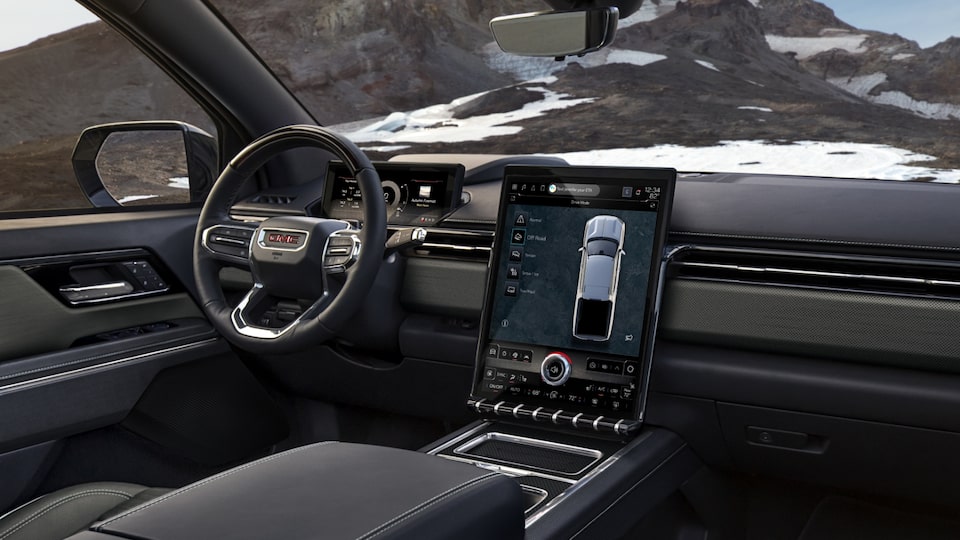 Wide Interior View of the Front Seats in a GMC Sierra EV AT4 Truck