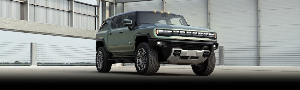 The GMC Hummer EV SUV Parked in an Empty Industrial Lot 