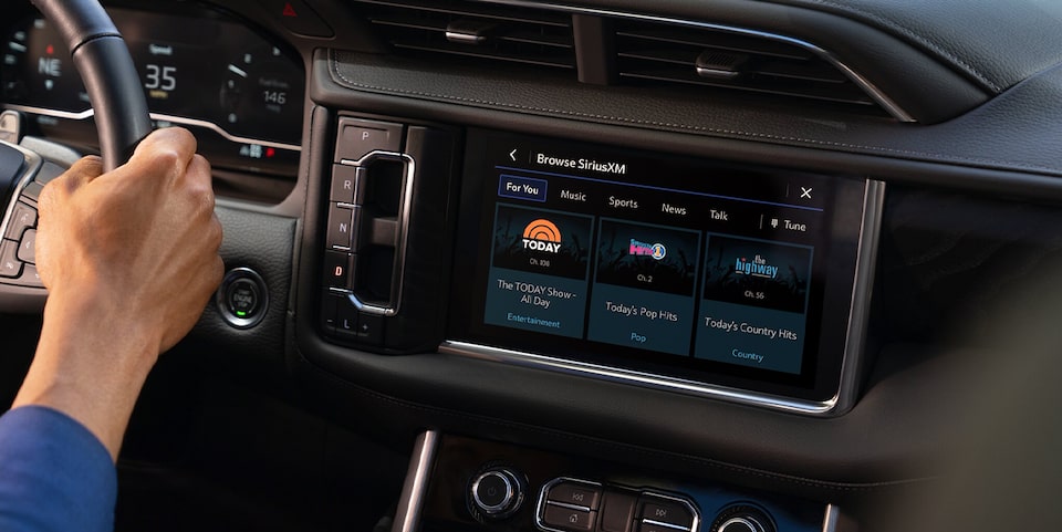 Close-up of the SiriusXM App In Use in a GMC Vehicle