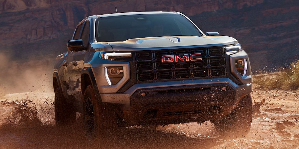 The GMC Canyon Elevation Driving Uphill in the Desert