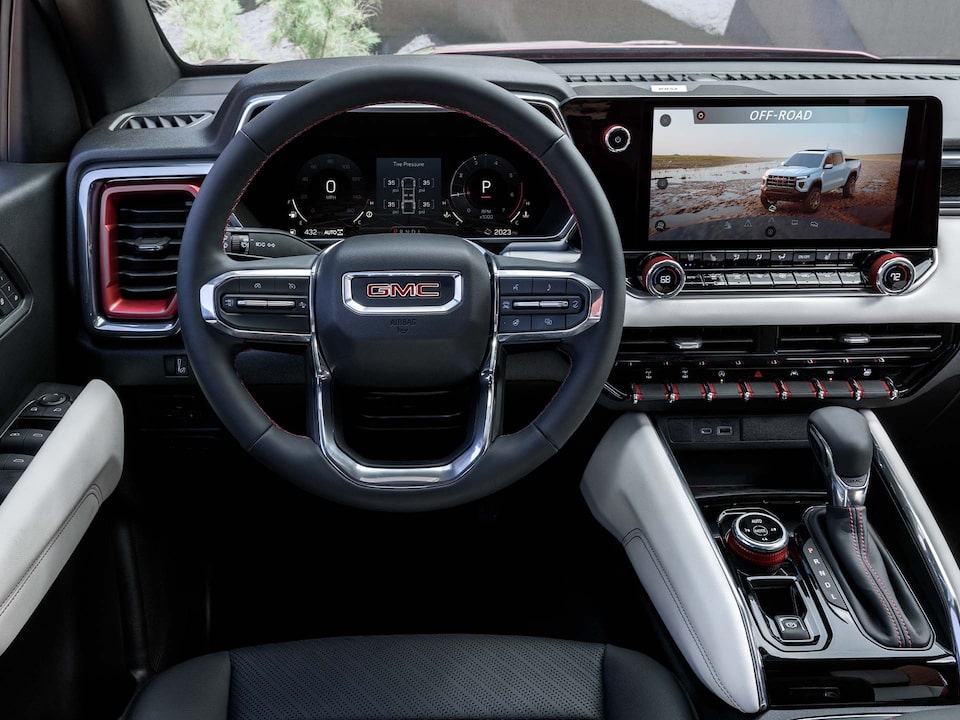 The Drivers Side View of the GMC Canyon Steering Wheel and Infotainment System