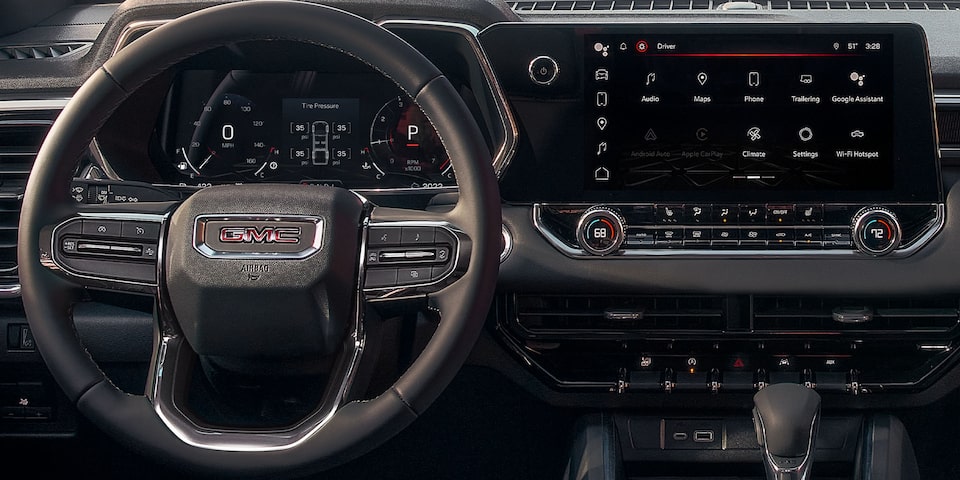 Close-up of the GMC Canyon Steering Wheel and Infotainment System