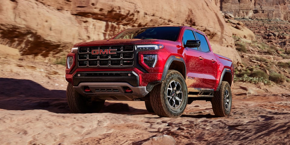 A Front Shot of the GMC Canyon AT4 Parked Off-Road on Grass