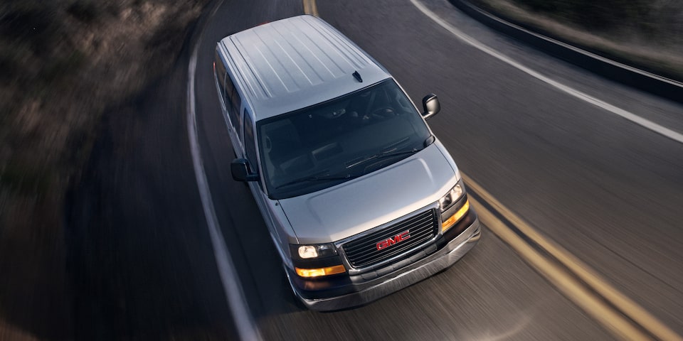 An Aerial Shot of the GMC Savana Cargo Van Driving On-Road