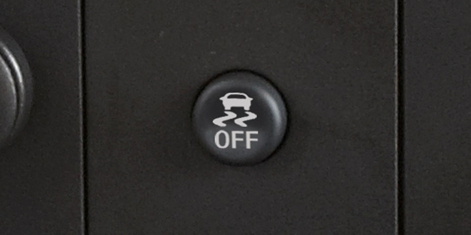 Close-Up on the Stabilitrak Button on the GMC Savana Cargo Van