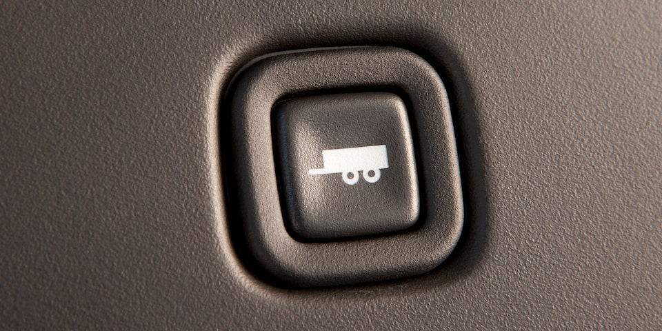 Close-Up on the Towing Haul Mode Button in the GMC Savana Passenger Van