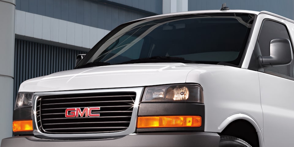 Close-Up on the Front Grille and Front Exterior of the GMC Savana Cargo Van