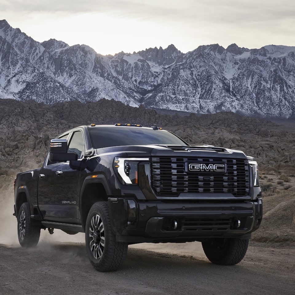 The Onyx Black GMC Sierra HD Driving Off-Road