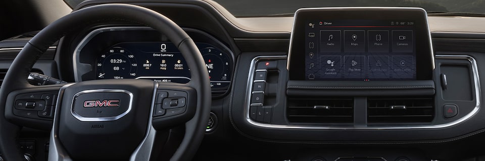 Infotainment System Touch Screen Display And Steering Wheel Inside the 2024 GMC Yukon