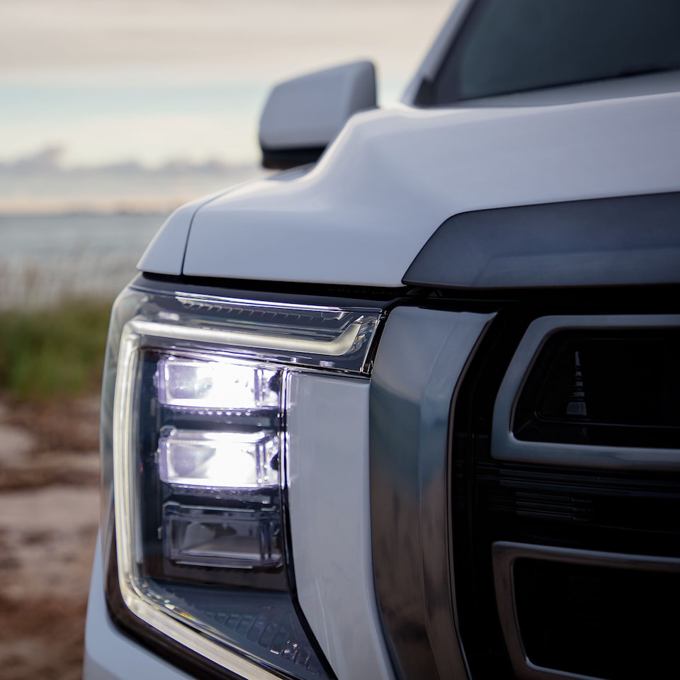 Close-Up on the Front Headlight of the GMC Yukon