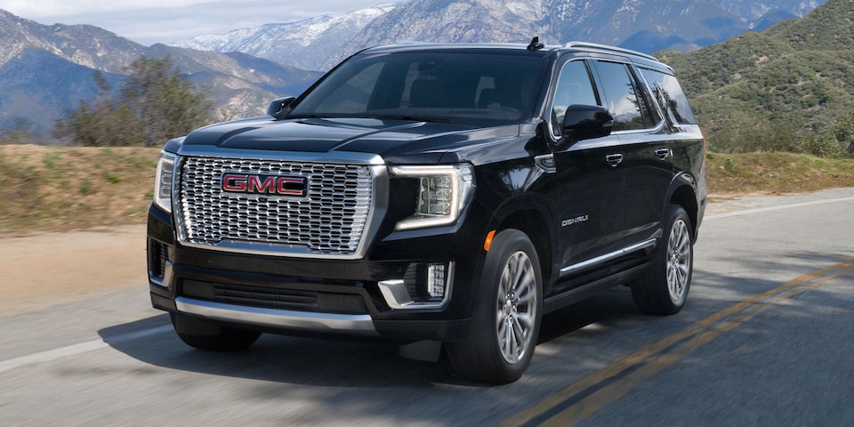 The Black GMC Yukon Denali Driving On-Road