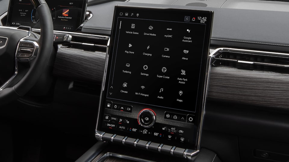 Close-up View of the Steering Wheel and Infotainment Screen in the GMC Sierra EV