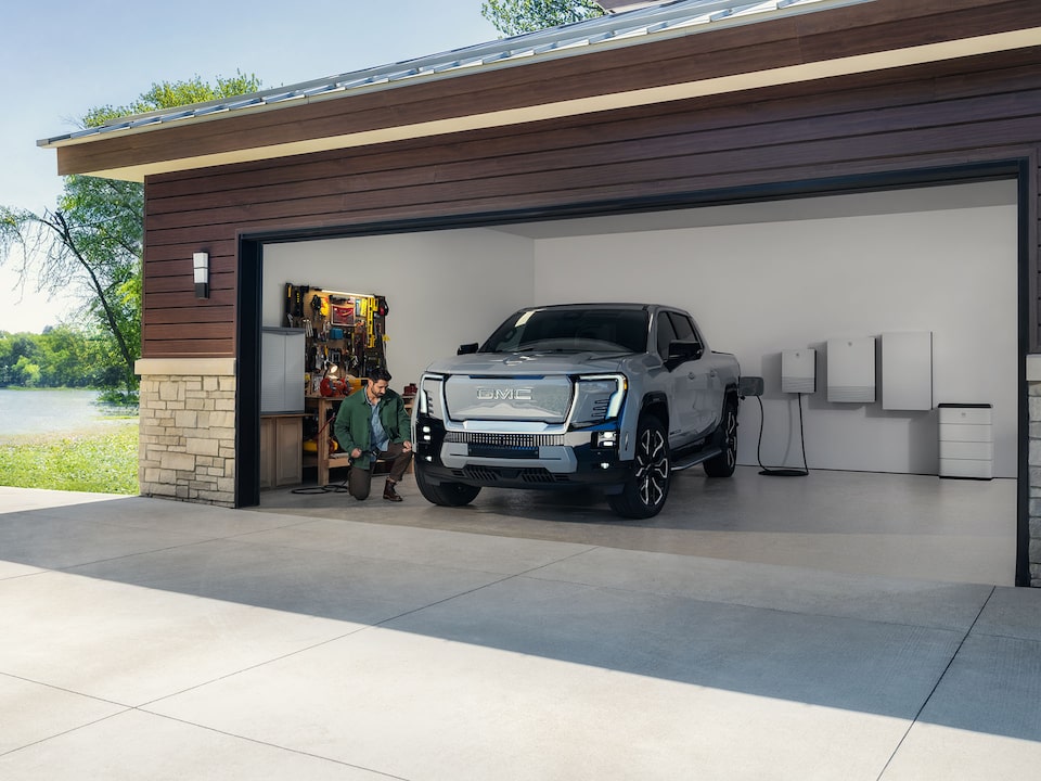 2025 GMC Sierra EV Pickup Truck Parked in a Garage